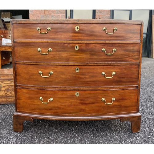 33 - AN EXCELLENT MAHOGANY BOW FRONTED FOUR DRAWER CHEST, four panelled graduated drawers with brass hand... 