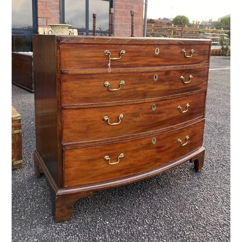 33 - AN EXCELLENT MAHOGANY BOW FRONTED FOUR DRAWER CHEST, four panelled graduated drawers with brass hand... 