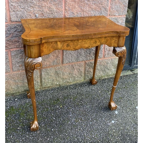 37 - AN ANTIQUE GEORGE II STYLE WALNUT CARD TABLE, with inlay to rectangular lobed hinged top enclosing g... 