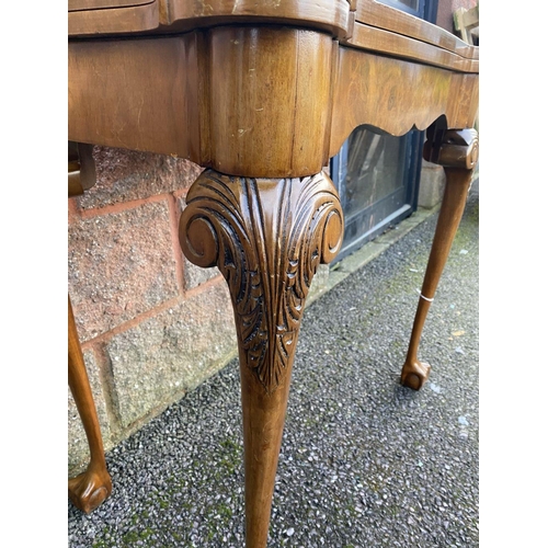 37 - AN ANTIQUE GEORGE II STYLE WALNUT CARD TABLE, with inlay to rectangular lobed hinged top enclosing g... 