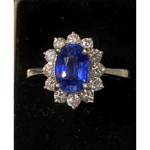 38 - A STUNNING 18CT WHITE GOLD CEYLON SAPPHIRE & DIAMOND CLUSTER RING, sapphire 2.97cts, surrounded by 1... 