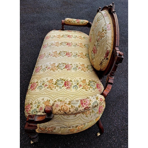 4 - AN ANTIQUE LOUIX XVI STYLE SETEE, upholstered with floral fabric, within carved mahogany frame with ... 