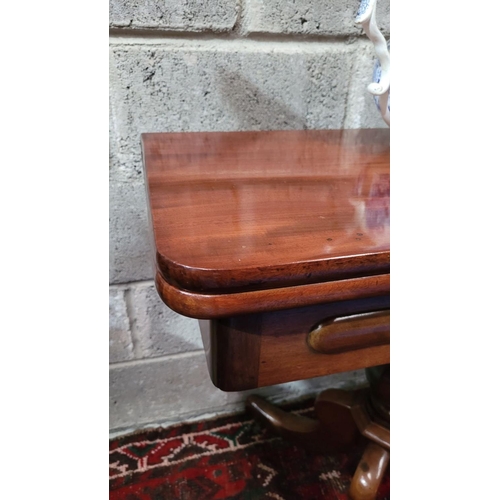 45 - A VERY FINE 19TH CENTURY FOLD OVER MAHOGANY TEA TABLE, the curved top turns and folds open to reveal... 