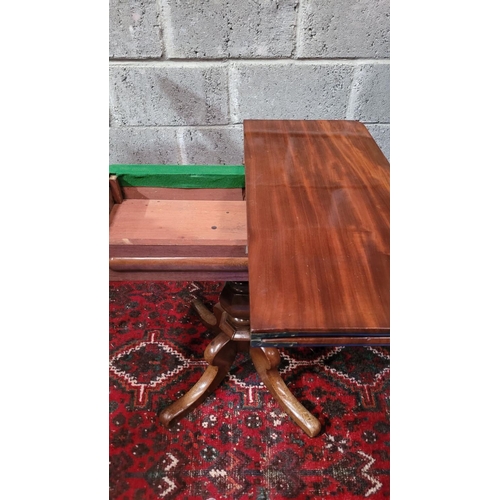 45 - A VERY FINE 19TH CENTURY FOLD OVER MAHOGANY TEA TABLE, the curved top turns and folds open to reveal... 