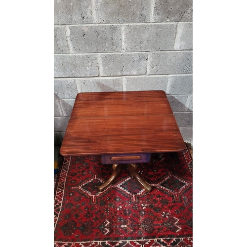 45 - A VERY FINE 19TH CENTURY FOLD OVER MAHOGANY TEA TABLE, the curved top turns and folds open to reveal... 