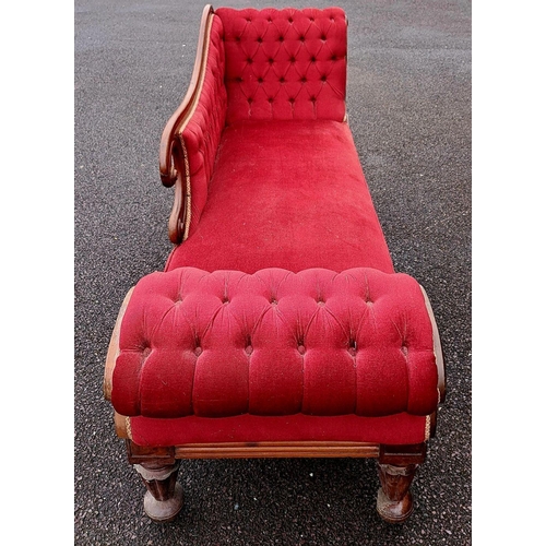 5 - AN EXCELLENT LATE VICTORIAN MAHOGANY CHAISE LOUNGE, upholstered with red fabric, having scrolling bu... 