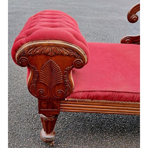 5 - AN EXCELLENT LATE VICTORIAN MAHOGANY CHAISE LOUNGE, upholstered with red fabric, having scrolling bu... 