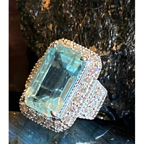 52 - A MAGNIFICENT WHITE GOLD AQUAMARINE & DIAMOND RING, 7.59ct aquamarine surrounded by brilliant cut di... 