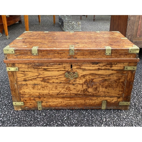 70 - A 19TH CENTURY CAMPAIGN TRUNK, brass bindings, and carrying handles to sides. Dimensions: 69cm wide ... 