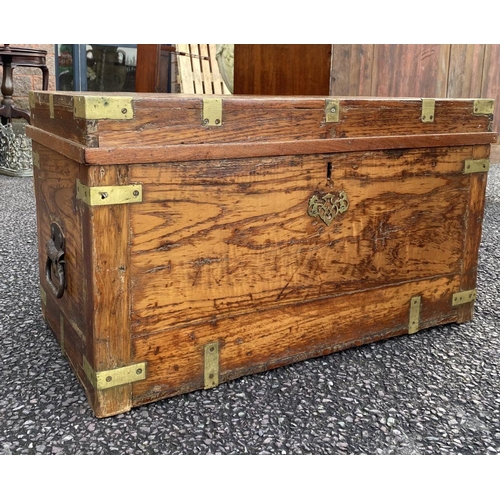 70 - A 19TH CENTURY CAMPAIGN TRUNK, brass bindings, and carrying handles to sides. Dimensions: 69cm wide ... 