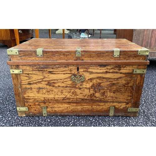 70 - A 19TH CENTURY CAMPAIGN TRUNK, brass bindings, and carrying handles to sides. Dimensions: 69cm wide ... 