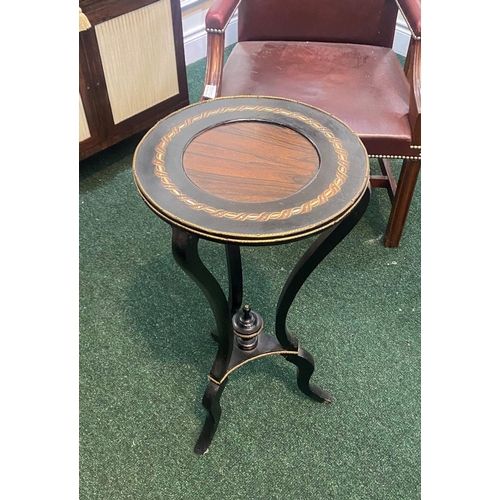 73 - A LATE 19TH CENTURY ROSEWOOD TABLE, with decorative mother of pearl inset to circular top, brass mou... 