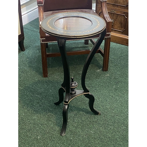 73 - A LATE 19TH CENTURY ROSEWOOD TABLE, with decorative mother of pearl inset to circular top, brass mou... 