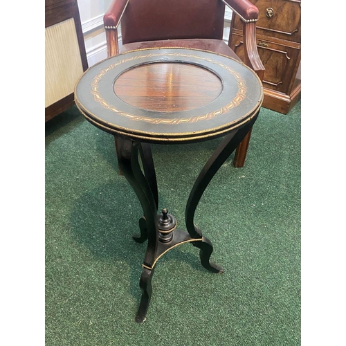 73 - A LATE 19TH CENTURY ROSEWOOD TABLE, with decorative mother of pearl inset to circular top, brass mou... 