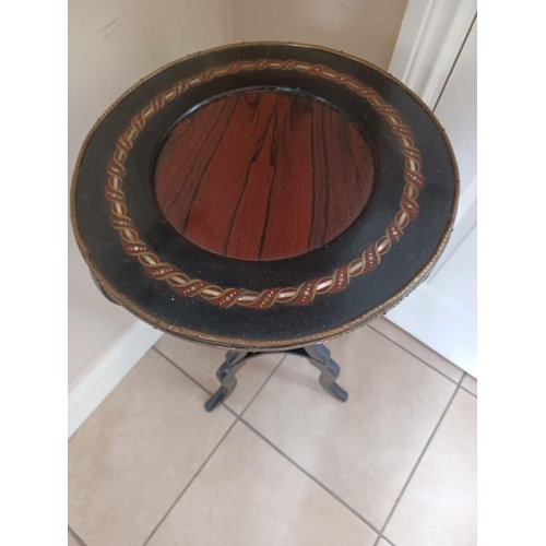 73 - A LATE 19TH CENTURY ROSEWOOD TABLE, with decorative mother of pearl inset to circular top, brass mou... 