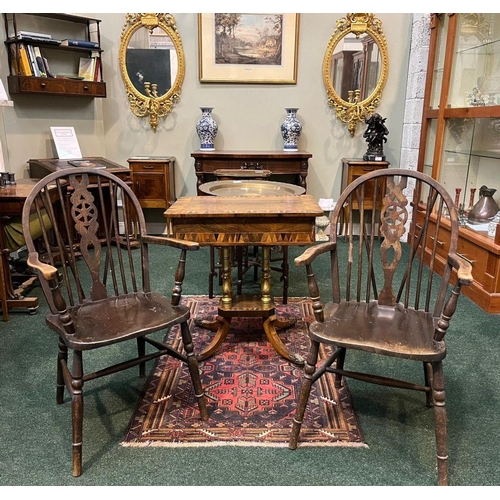 75 - A PAIR OF WHEELBACK WINSOR COUNTRY CHAIRS, spindle backed with carved back splat, turned supports to... 