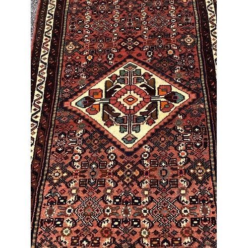 77 - A PERSIAN HUSSENARD RUNNER RUG, material: hand spun wool with natural organic dyes; design: this rug... 