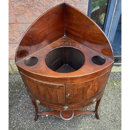 79 - A GEORGE III STYLE MAHOGANY INLAID CORNER WASHSTAND, two inlaid doors above drawer with brass handle... 