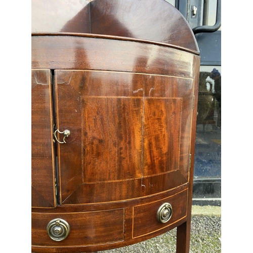 79 - A GEORGE III STYLE MAHOGANY INLAID CORNER WASHSTAND, two inlaid doors above drawer with brass handle... 