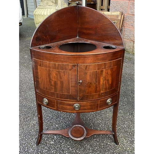 79 - A GEORGE III STYLE MAHOGANY INLAID CORNER WASHSTAND, two inlaid doors above drawer with brass handle... 