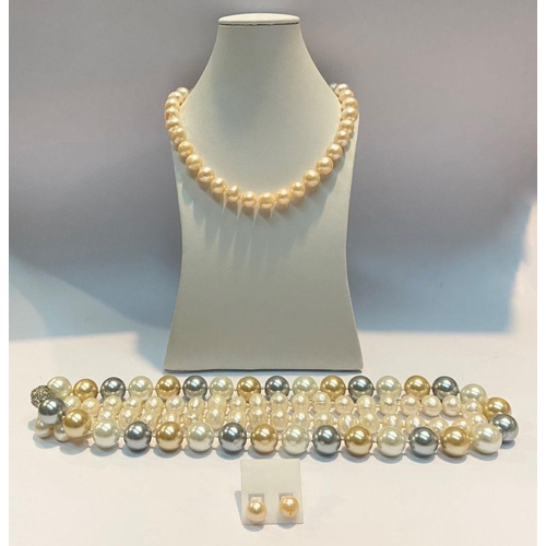 82 - AN IMITATION PEARL JEWELLERY LOT TO INCLUDE three necklaces, with circular magnetic clasp, decorated... 