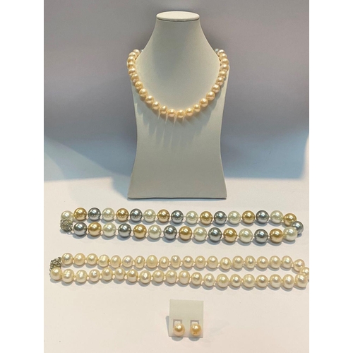 82 - AN IMITATION PEARL JEWELLERY LOT TO INCLUDE three necklaces, with circular magnetic clasp, decorated... 