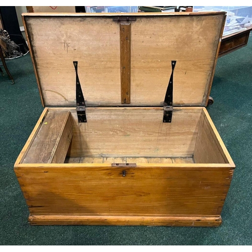 87 - AN IRISH 19TH CENTURY PITCH PINE BLANKET BOX/CHEST, complete with original lock, fitted interior to ... 