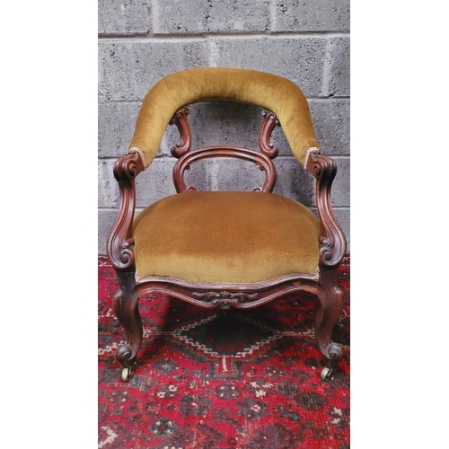 89 - A GOOD QUALITY 19TH CENTURY CARVED LOW RISE OPEN ARMCHAIR, with curved padded crest rail that runs d... 