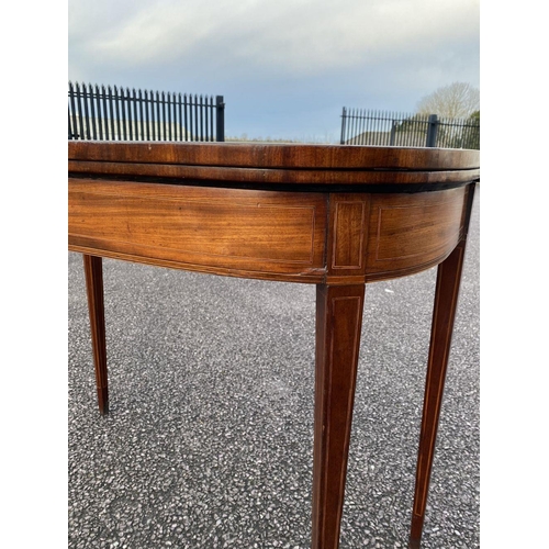 90 - A GEORGIAN MAHOGANY INLAID D-SHAPED CARD TABLE, with inlay and banding, opening to green baize lined... 