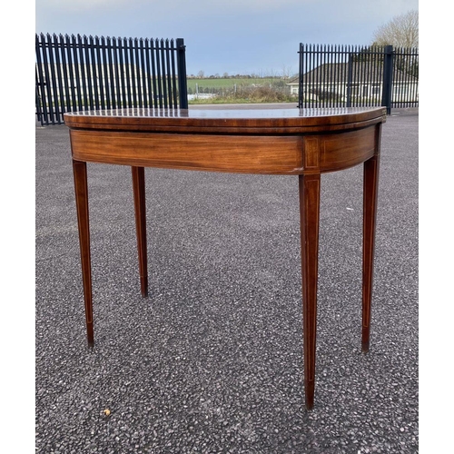 90 - A GEORGIAN MAHOGANY INLAID D-SHAPED CARD TABLE, with inlay and banding, opening to green baize lined... 