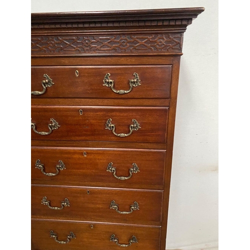 92 - AN IRISH MAHOGANY SEVEN DRAWER TALLBOY CHEST, fluted dentil cornice above carved panel, seven drawer... 