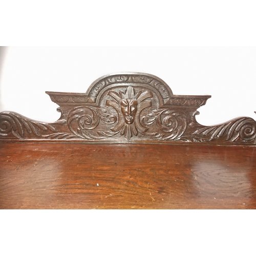 172 - A FINE 19TH CENTURY OAK THREE TIER BUFFET / WHAT-NOT / SIDE BOARD, with carved acanthus motif throug... 