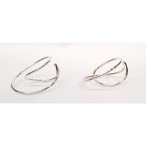 110 - A PAIR OF GEORG JENSEN STERLING SILVER 'INFINITY' EAR CUFFS, a lovely dynamic pair of ear cuffs that... 