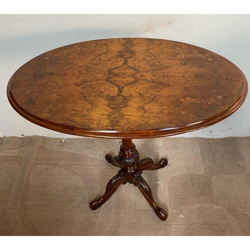 13 - AN EXCELLENT VICTORIAN WALNUT WINE TABLE, tip-up top with decorative leaf and floral inlay, above tu... 