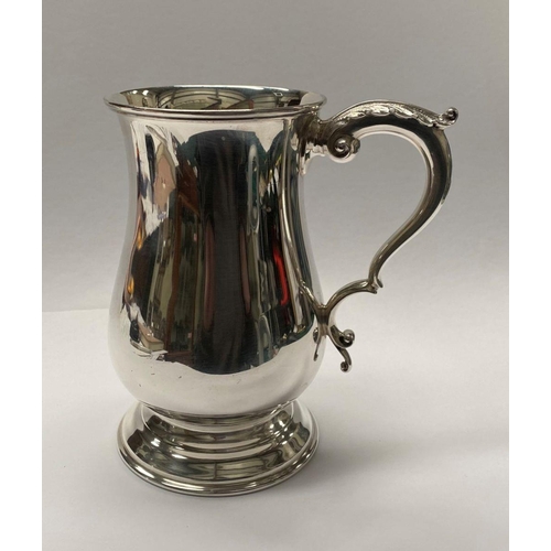 139 - A VINTAGE SILVER TANKARD, Maker James Dixon & Sons Ltd Sheffield, 1943, of baluster form, with acant... 