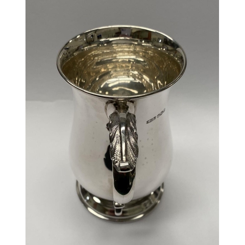 139 - A VINTAGE SILVER TANKARD, Maker James Dixon & Sons Ltd Sheffield, 1943, of baluster form, with acant... 