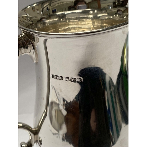 139 - A VINTAGE SILVER TANKARD, Maker James Dixon & Sons Ltd Sheffield, 1943, of baluster form, with acant... 