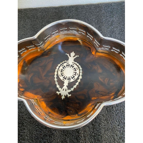 14 - A PAIR OF SHAPED SILVER PLATED WINE COASTERS, with pierced openwork design to border, tortoiseshell ... 