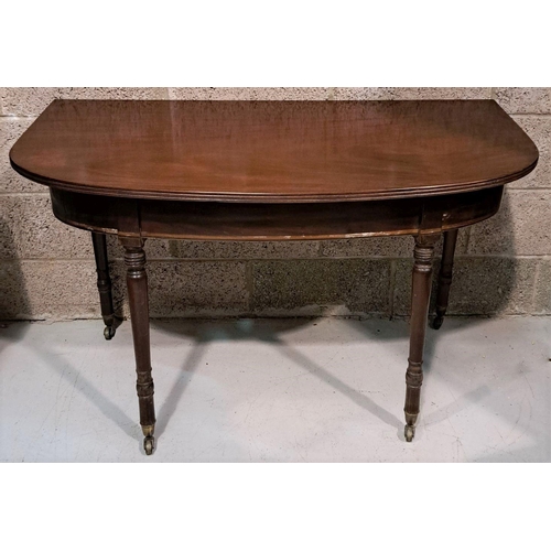 146 - AN ANTIQUE MAHOGANY CONSOLE/SIDE TABLE, with fluted edge, standing on turned leg with castors. Dimen... 