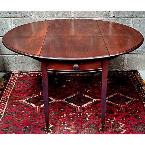 163 - A GEORGIAN-STYLE MAHOGANY DROP-LEAF TABLE bevelled edge; cockbeaded drawers with wooden knobs, taper... 