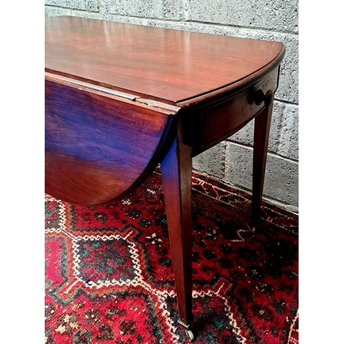 163 - A GEORGIAN-STYLE MAHOGANY DROP-LEAF TABLE bevelled edge; cockbeaded drawers with wooden knobs, taper... 