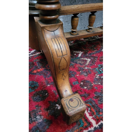 166 - AN EARLY 20TH CENTURY WALNUT & MAHOGANY FOLD OVER CARD TABLE, the top surface twists and folds open ... 