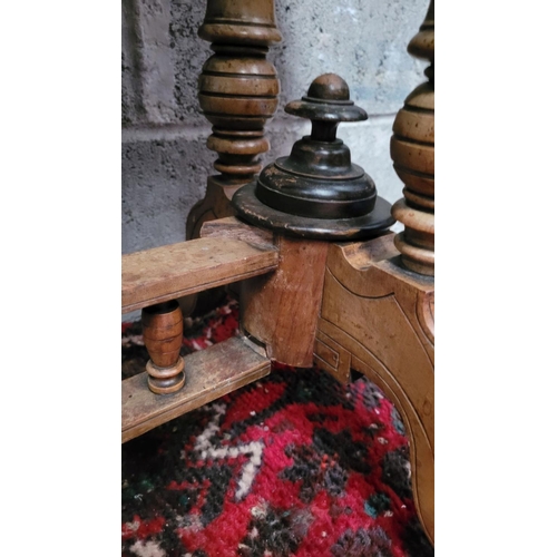 166 - AN EARLY 20TH CENTURY WALNUT & MAHOGANY FOLD OVER CARD TABLE, the top surface twists and folds open ... 