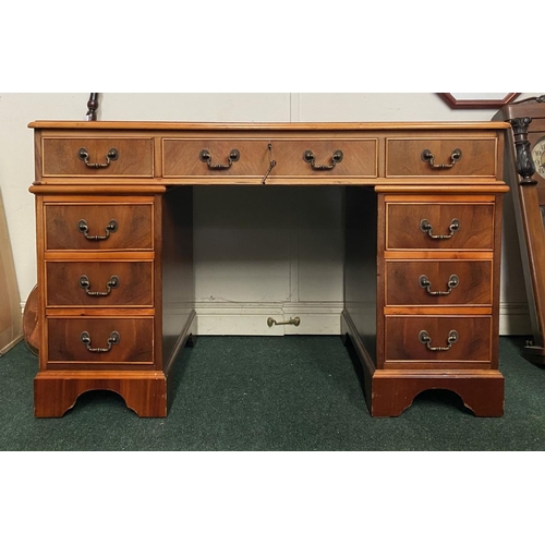 17 - AN EXCELLENT KEYHOLE/PEDESTAL DESK, with leather inset to top above nine panelled drawers with brass... 