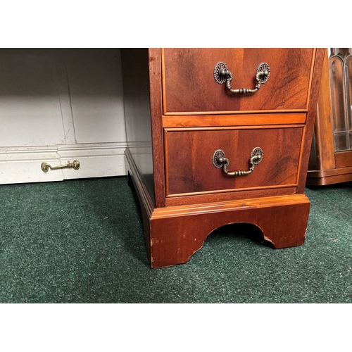 17 - AN EXCELLENT KEYHOLE/PEDESTAL DESK, with leather inset to top above nine panelled drawers with brass... 