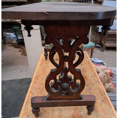 183 - AN OAK VICTORIAN BOWED SIDE TABLE with fine detail to the side-frames, and the ring-turned stretcher... 