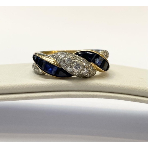 20 - A FANTASTIC TIFFANY & CO. TWO TONE SAPPHIRE AND DIAMOND TWIST RING, 1ct round brilliant cut diamonds... 