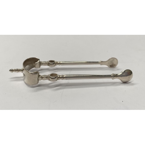 225 - A CASED PAIR OF SHEFFIELD SILVER SUGAR TONGS, Maker Thomas Bradbury & Sons Ltd, Arundel Street, Shef... 