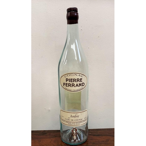 228 - A VINTAGE PIERRE FERRAND COGNAC DISPENSER ON STAND, three litre bottle with original labels, central... 