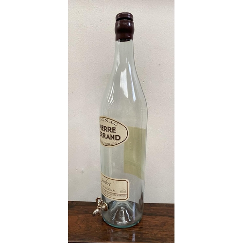 228 - A VINTAGE PIERRE FERRAND COGNAC DISPENSER ON STAND, three litre bottle with original labels, central... 